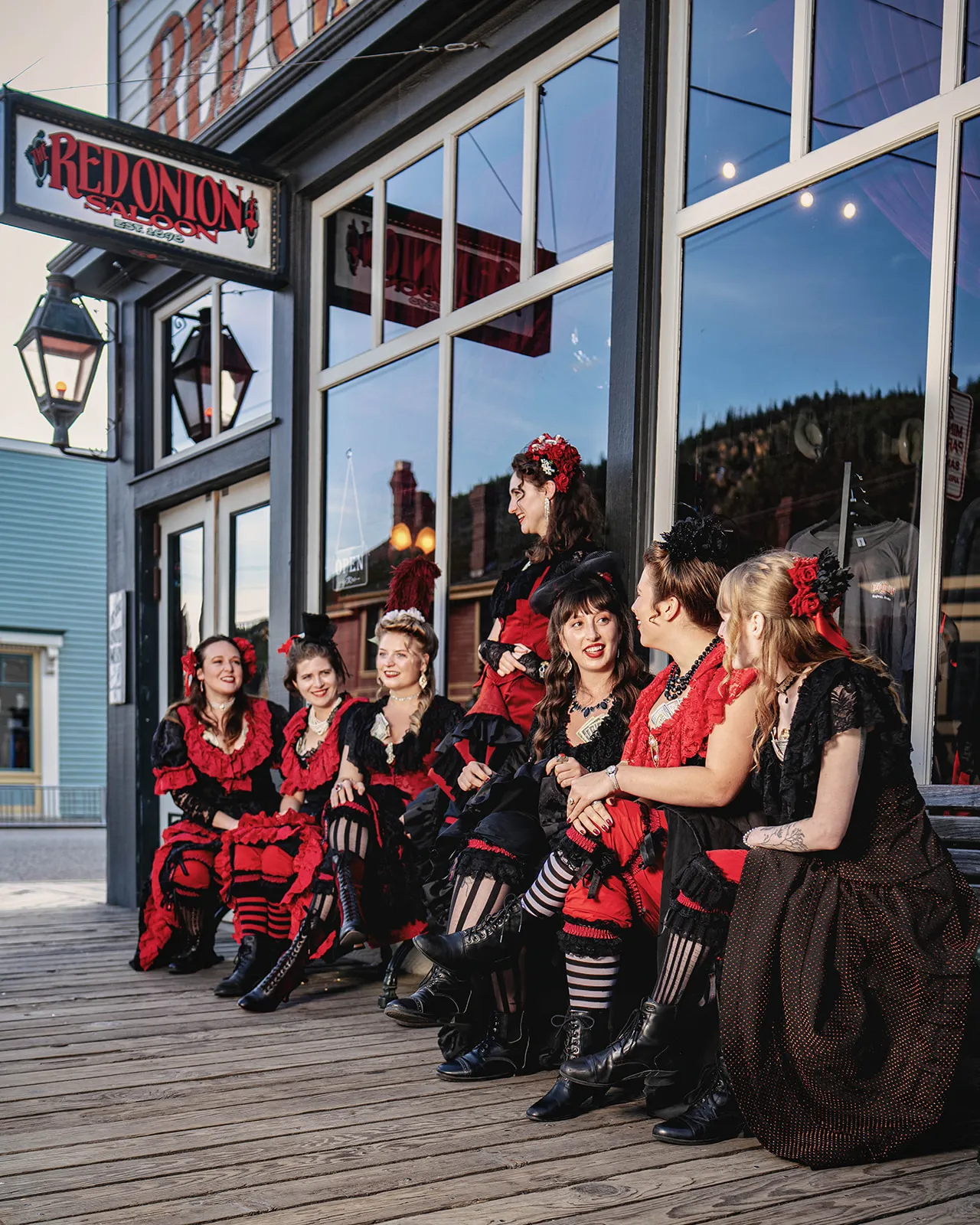 Madams outside on the bench